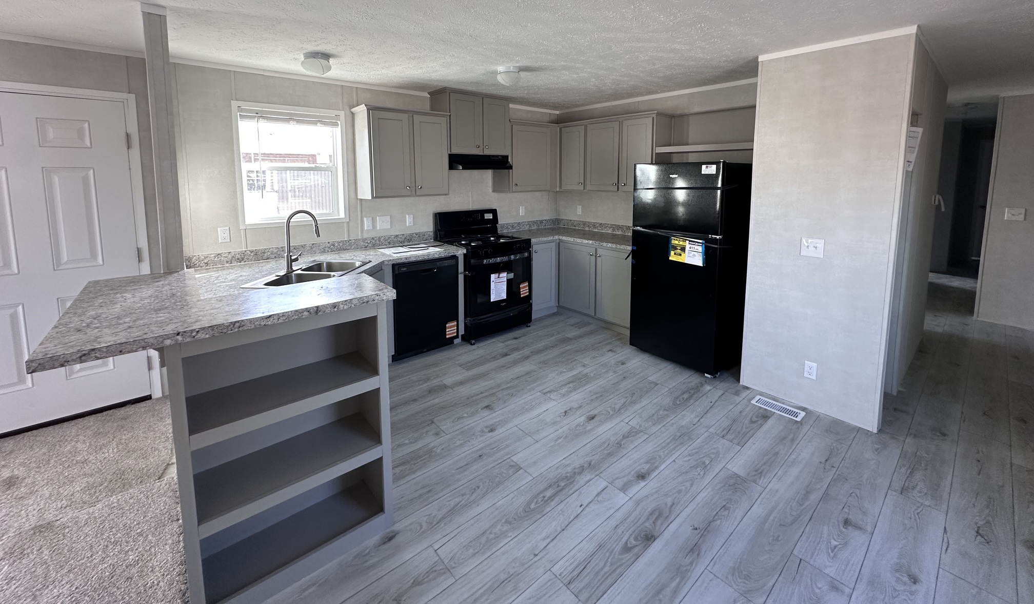 Greige Transitional Kitchen With Black Appliances Mobile Homes For Sale Gwinn MI