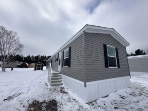 mobile home with snow